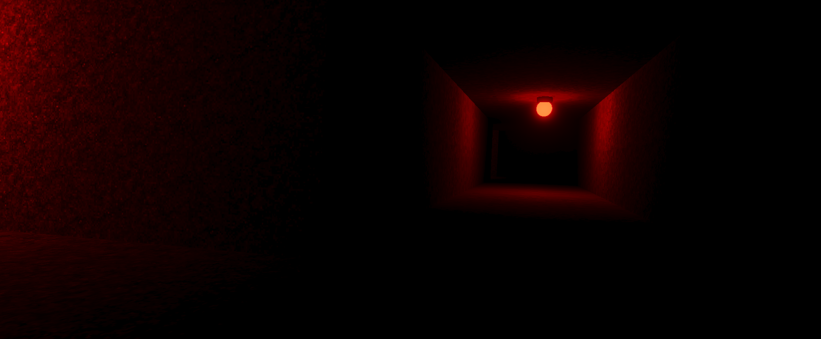 A dark corridor illuminated by a red light